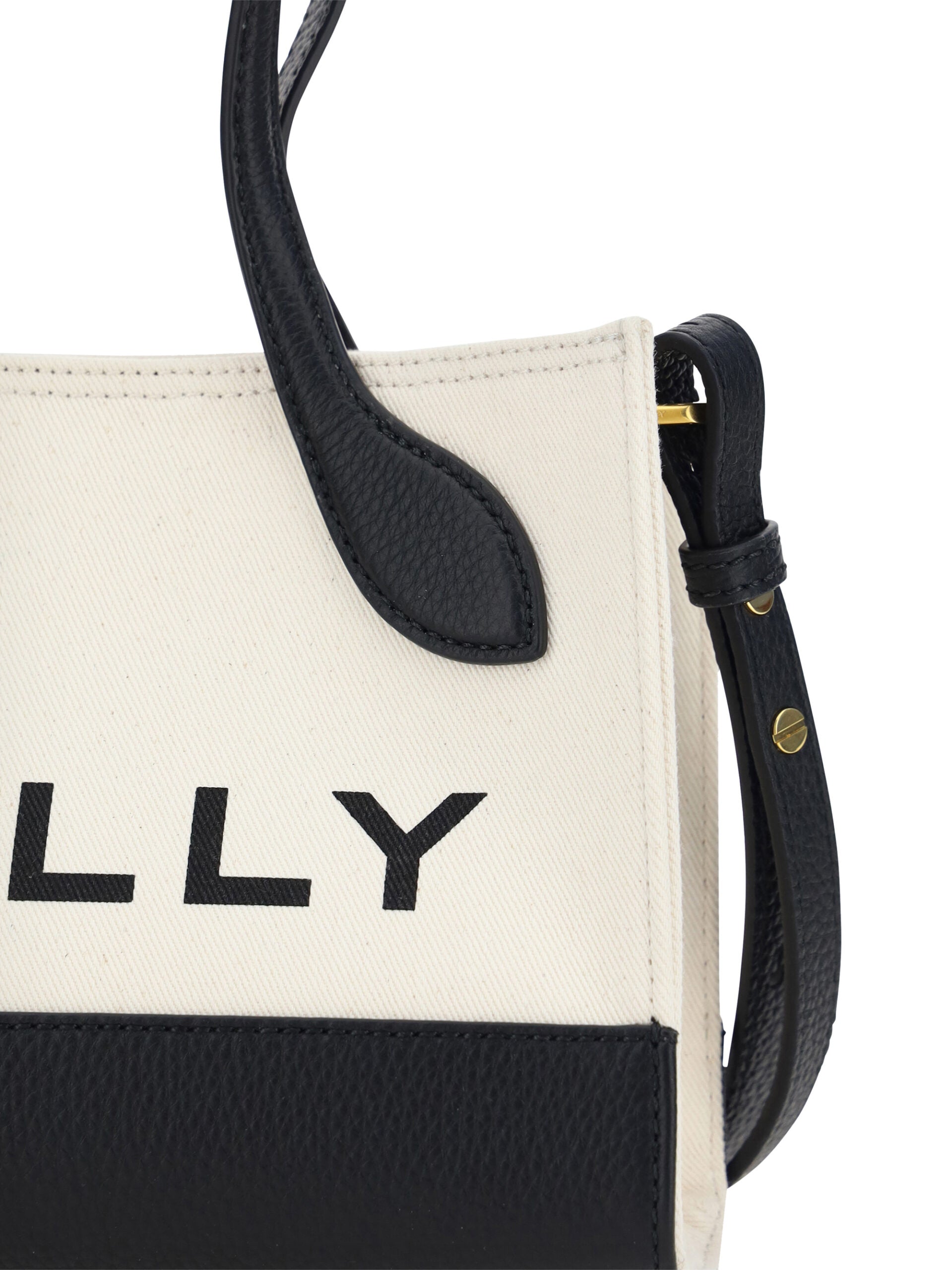 Schicke kontrastierende Mini-Handtasche aus Leder