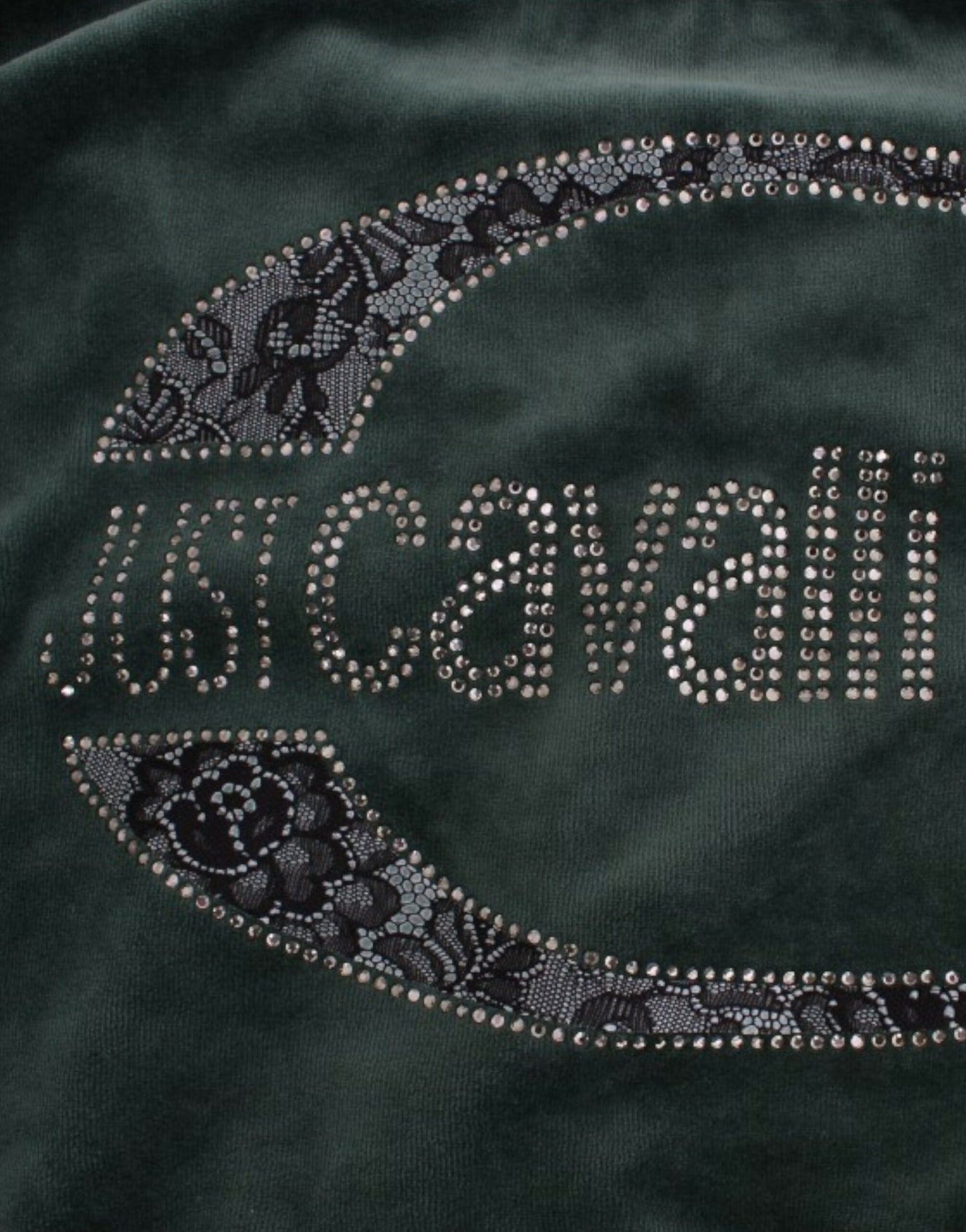 Eleganter grüner Pullover mit Strass-Detail