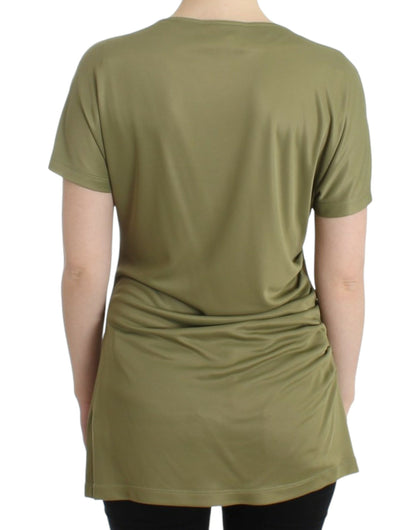 Elegante grüne Jerseybluse mit goldenen Akzenten
