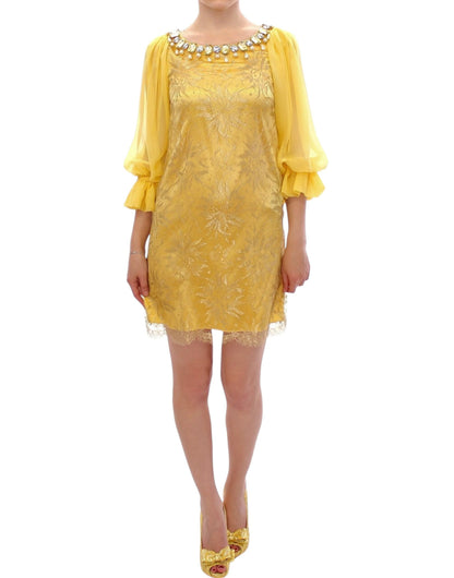 Gelbes Minikleid aus Spitze mit Kristallverzierung