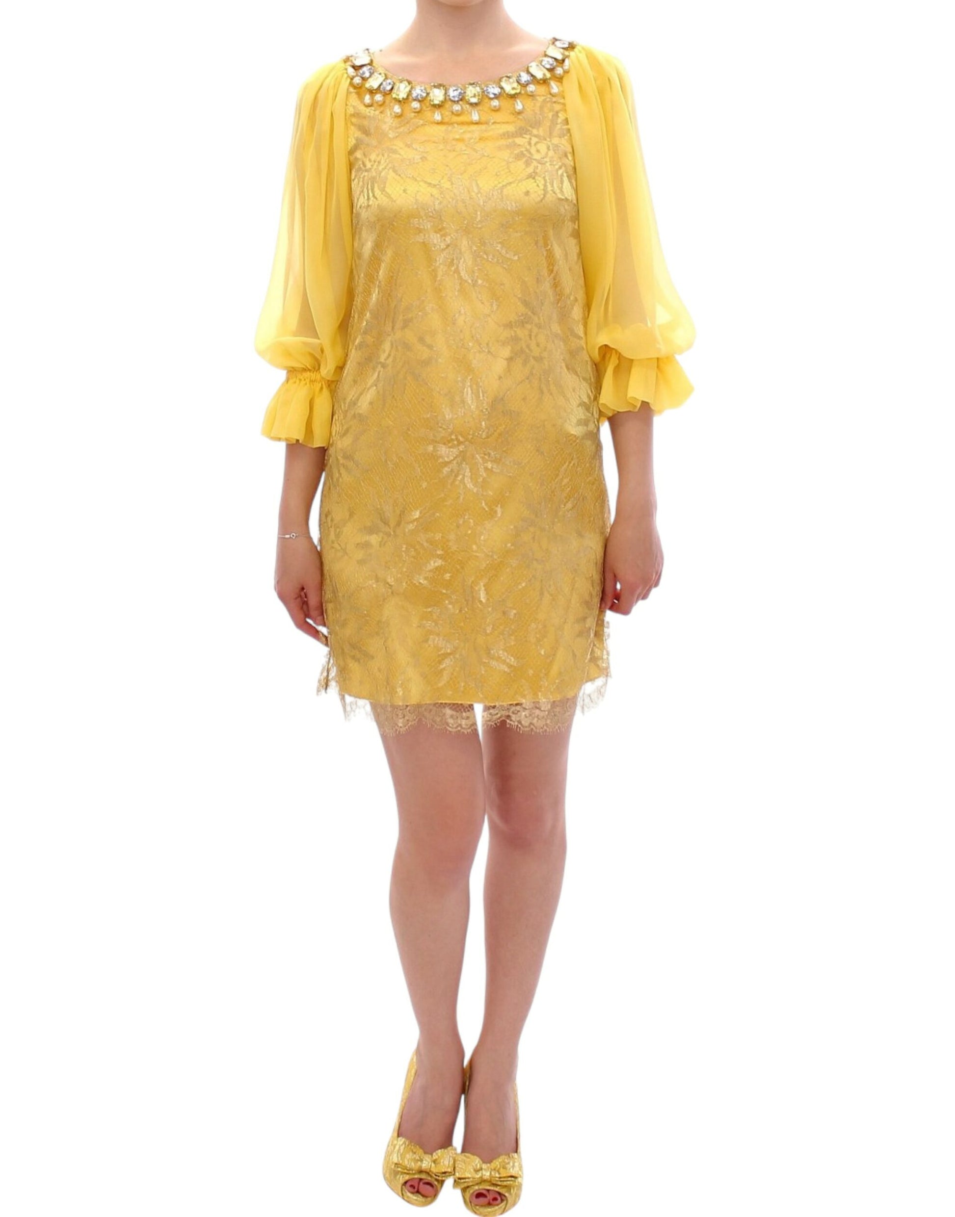 Gelbes Minikleid aus Spitze mit Kristallverzierung