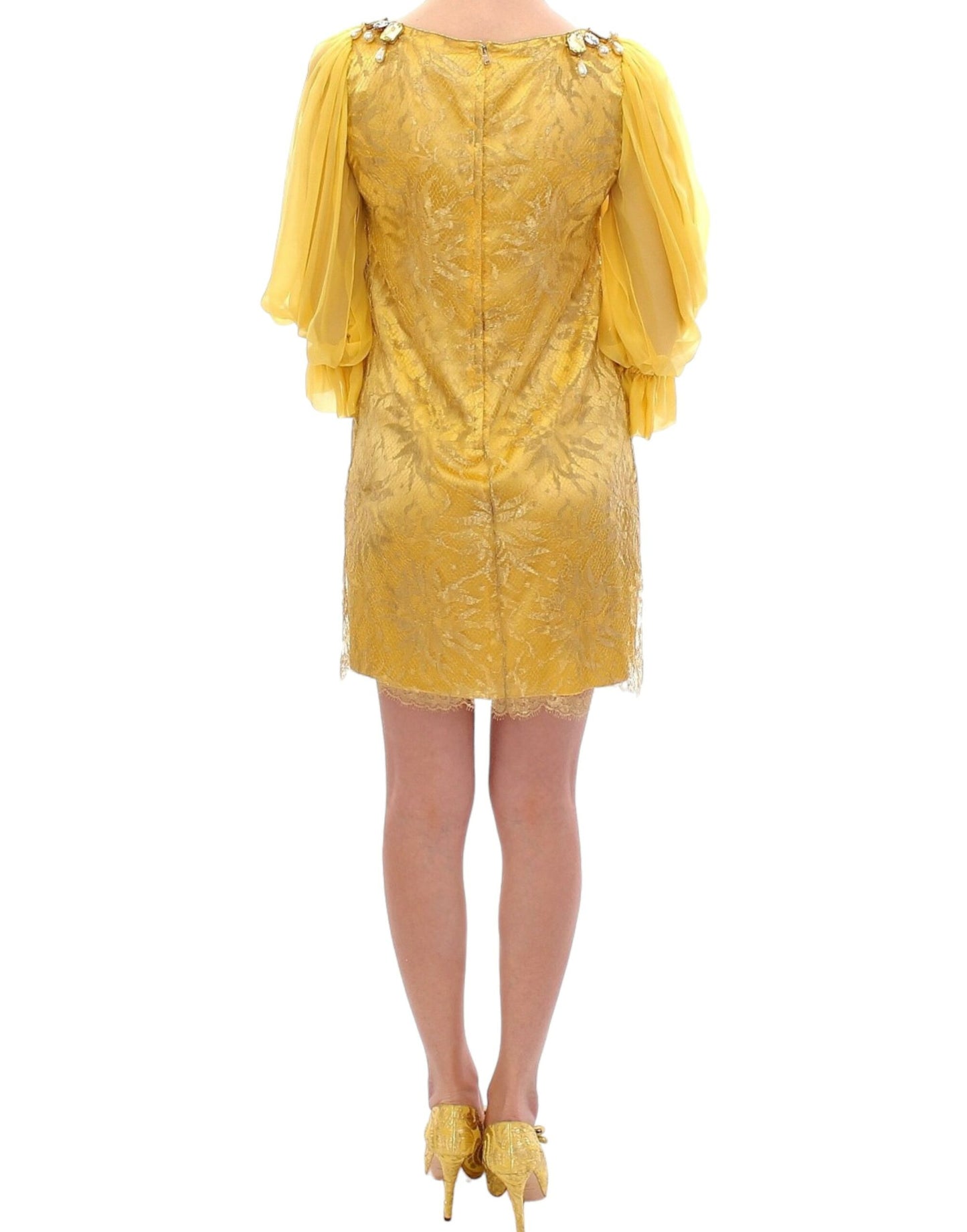 Gelbes Minikleid aus Spitze mit Kristallverzierung