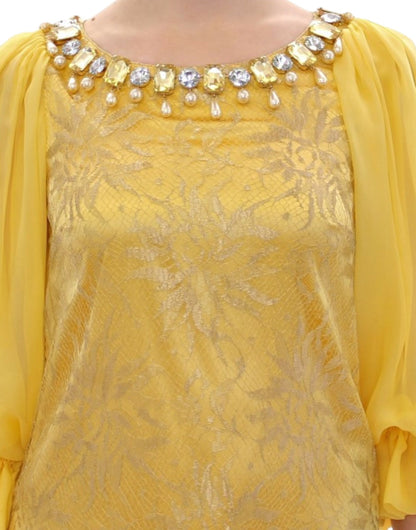 Gelbes Minikleid aus Spitze mit Kristallverzierung