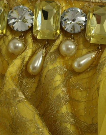Gelbes Minikleid aus Spitze mit Kristallverzierung