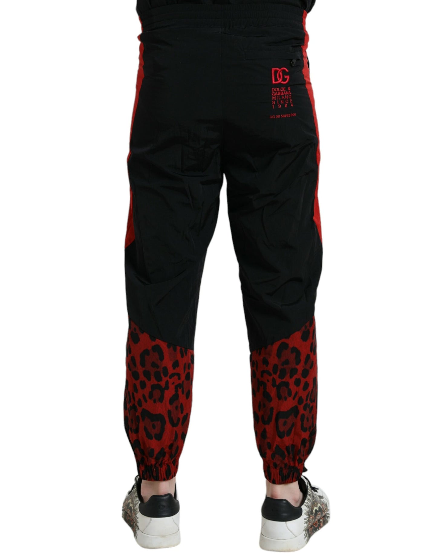 Schwarz-rote Jogginghose aus Nylon mit Leopardenmuster