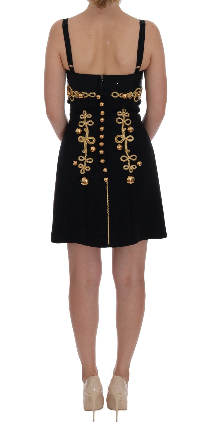 Elegantes schwarzes ärmelloses A-Linien-Kleid mit goldenen Details