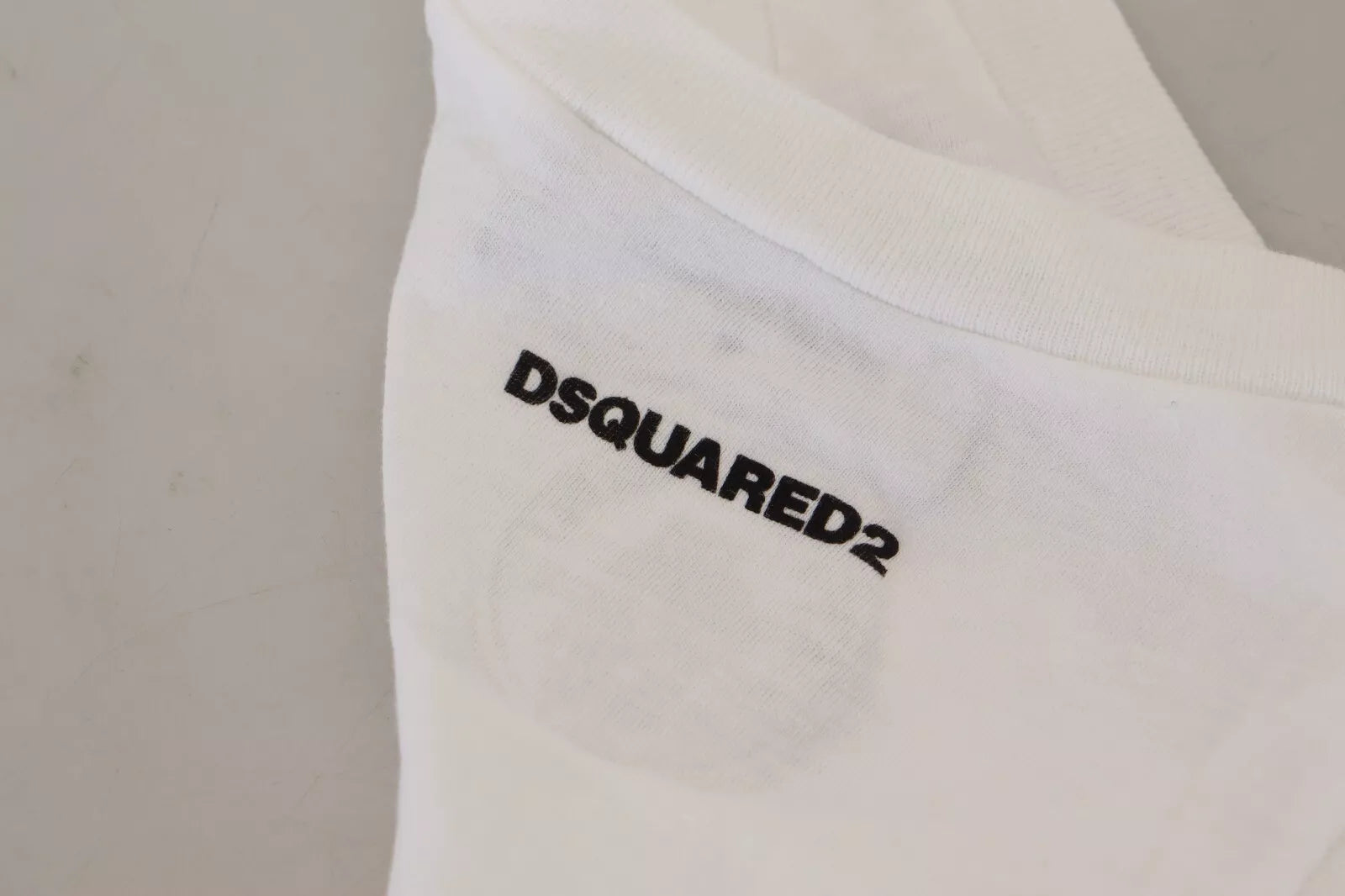 Weißes ärmelloses Tank-T-Shirt aus Baumwollleinen