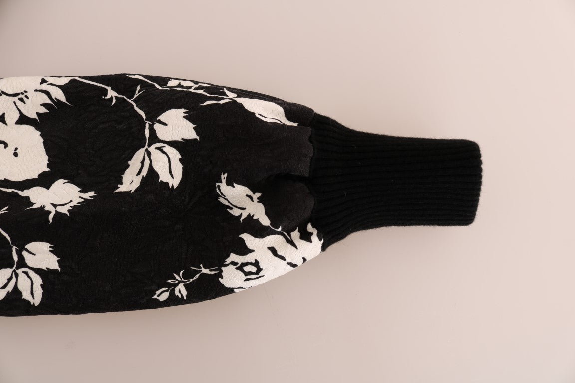Schwarzer Pullover mit Pelz und Blumenbrokat