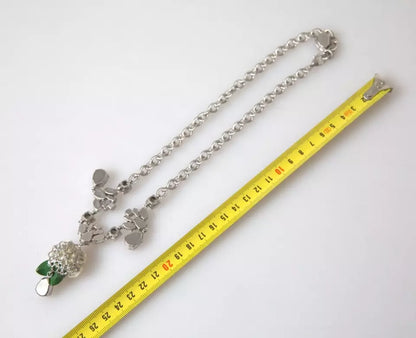 Halskette mit Rosenanhänger aus Messing und klarem Kristall