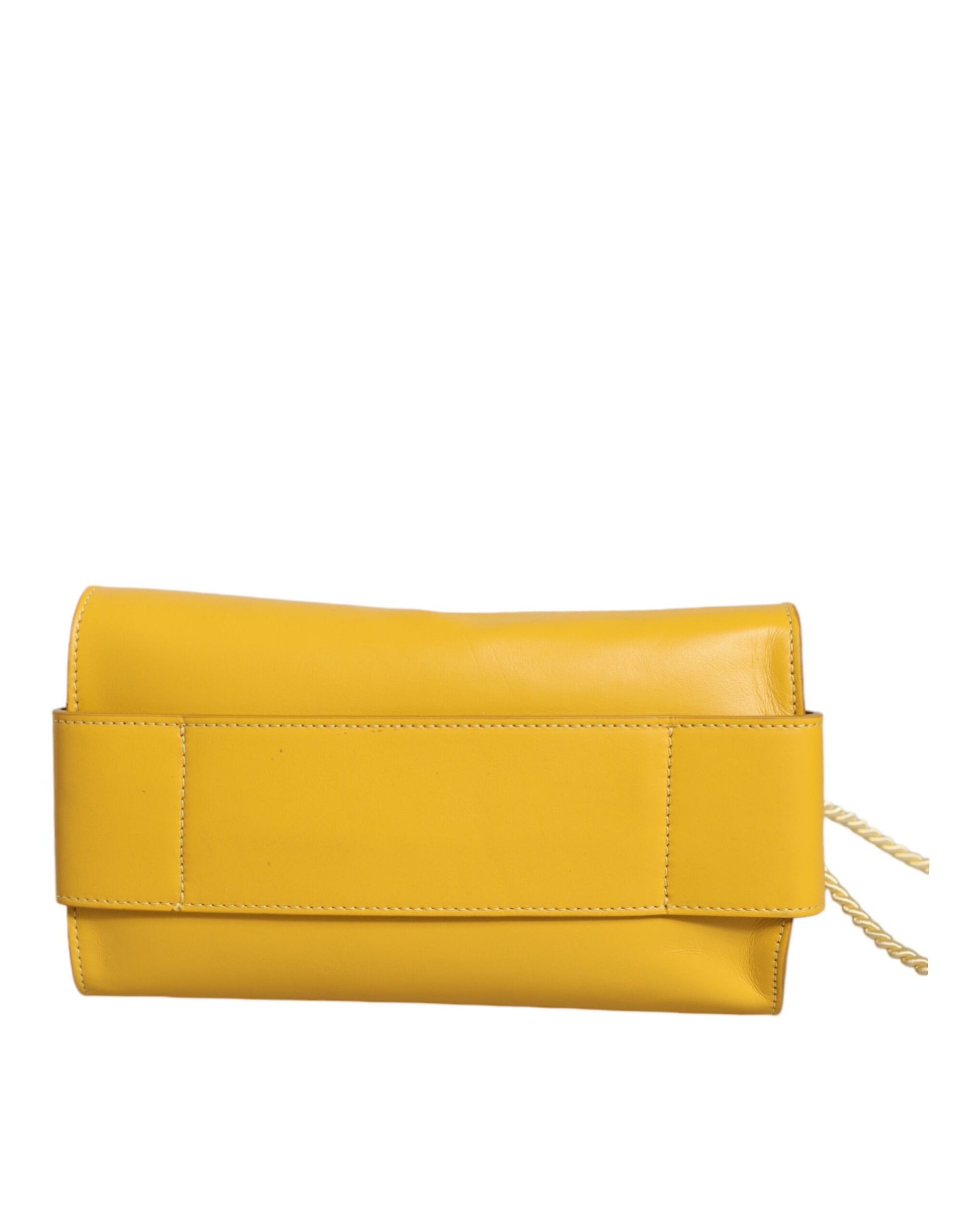 Gelbe Ledertasche mit Schultergurt und Tragegriff