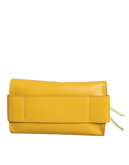 Gelbe Ledertasche mit Schultergurt und Tragegriff