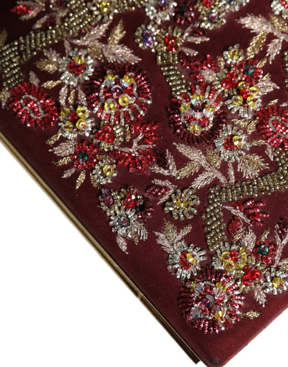 Bordeauxrote Clutch aus Samt mit Goldrahmen