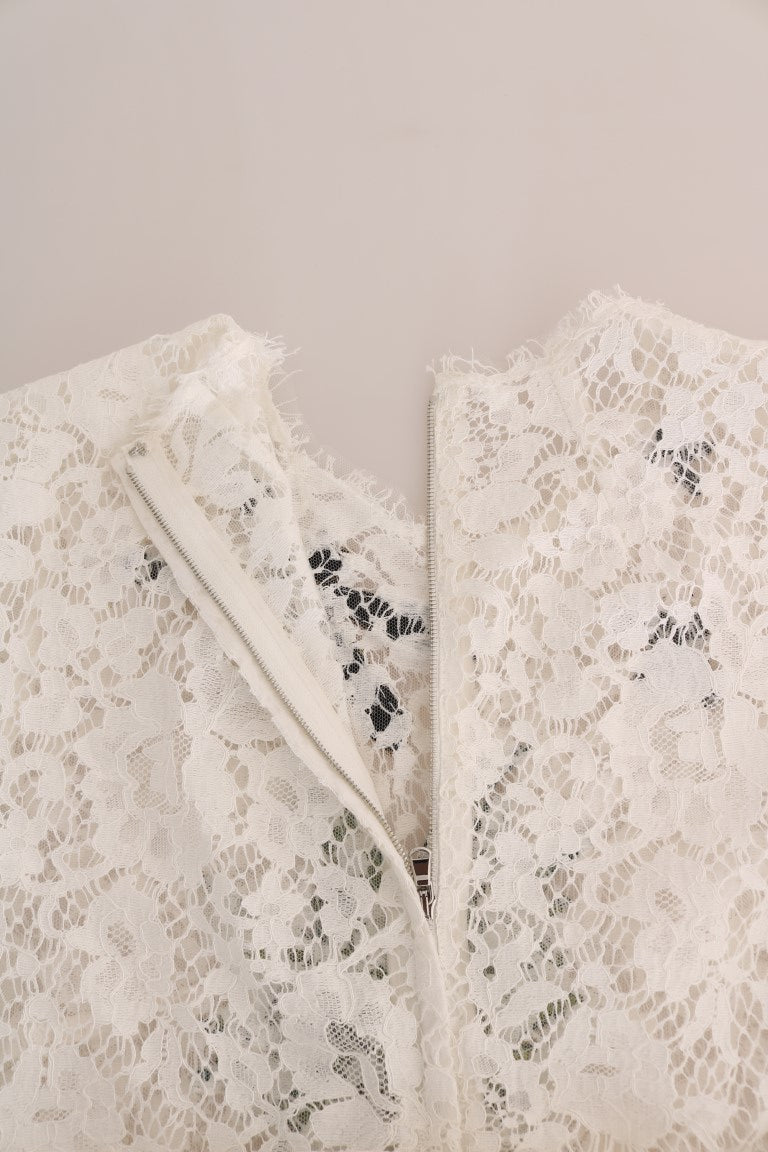 Elegante weiße Minibluse mit Spitzenverzierung